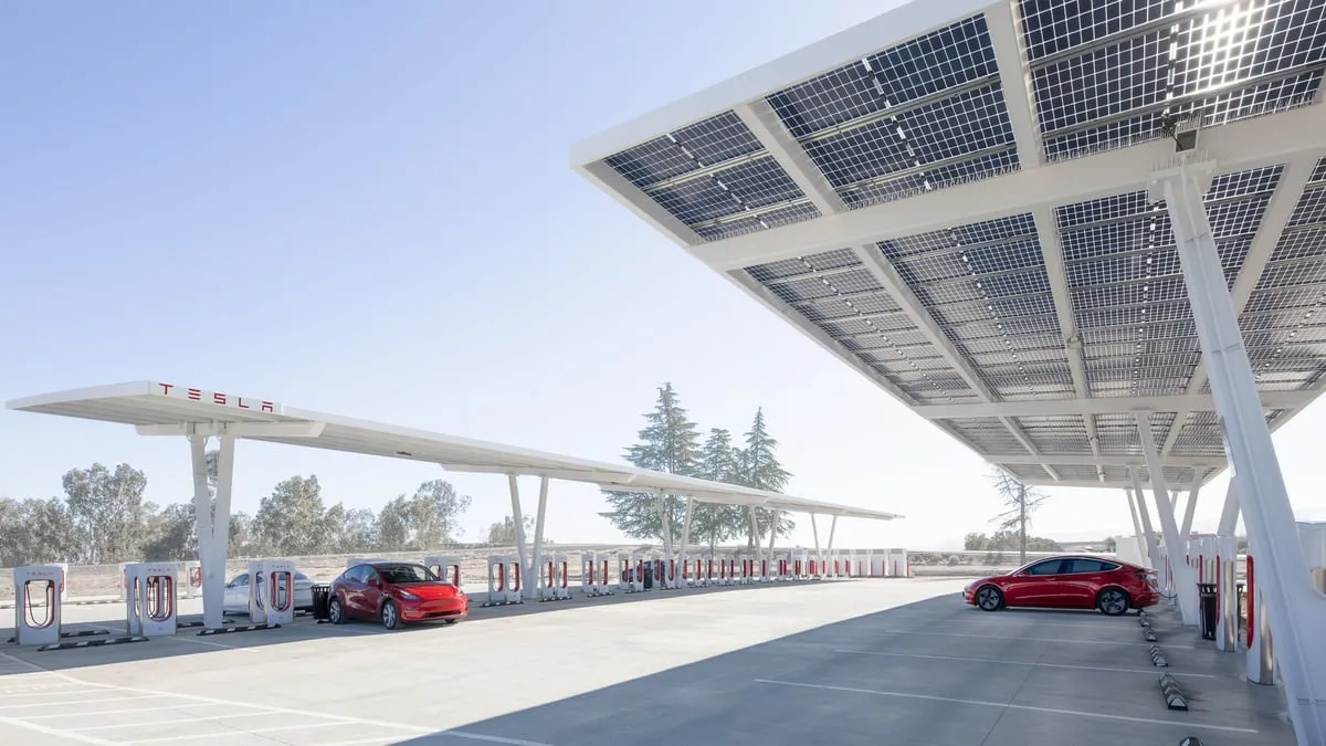 Commercial EV charging stations generating revenue at a business parking lot